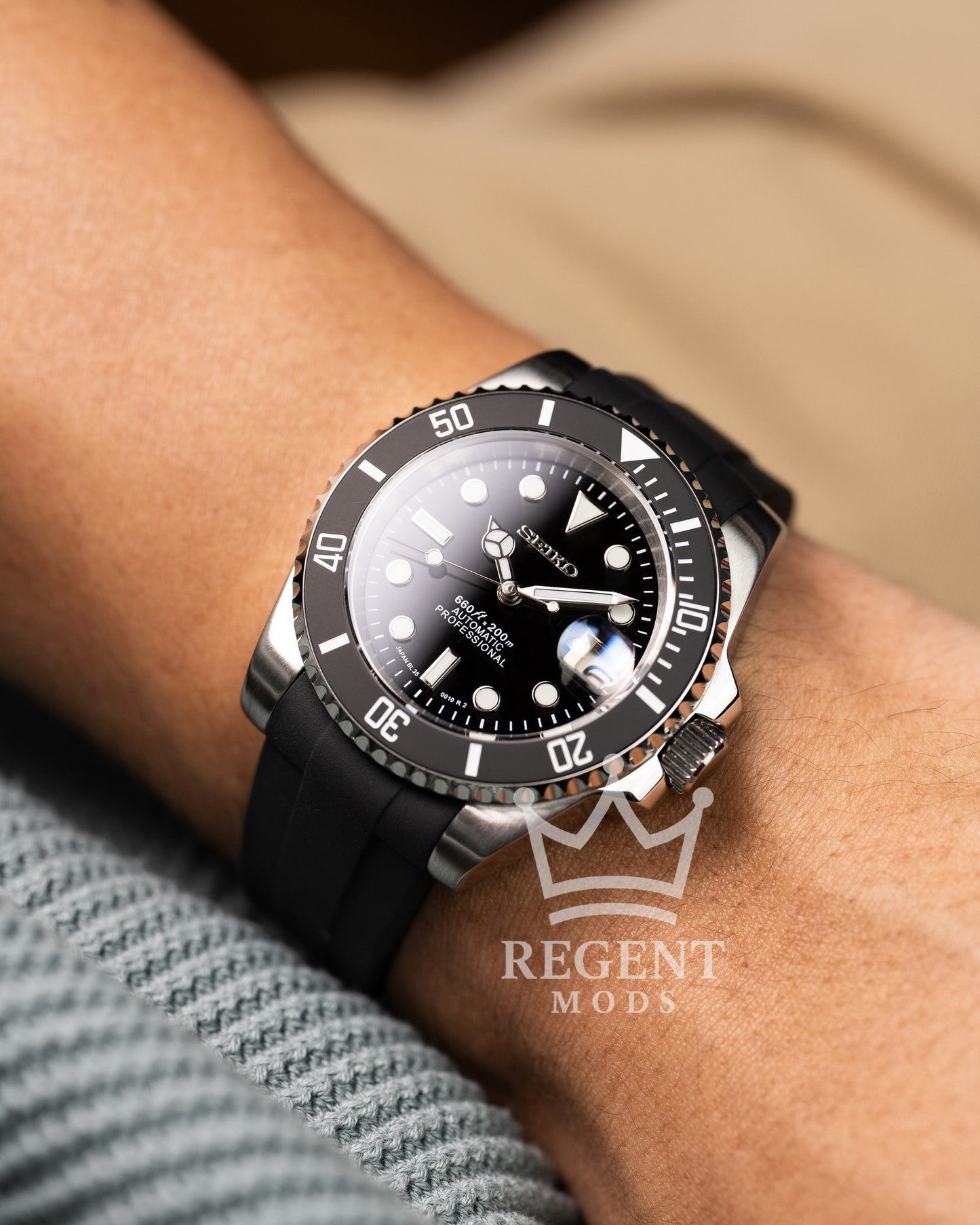Black Seiko Mod Submariner Worn On Wrist With Rubber Strap