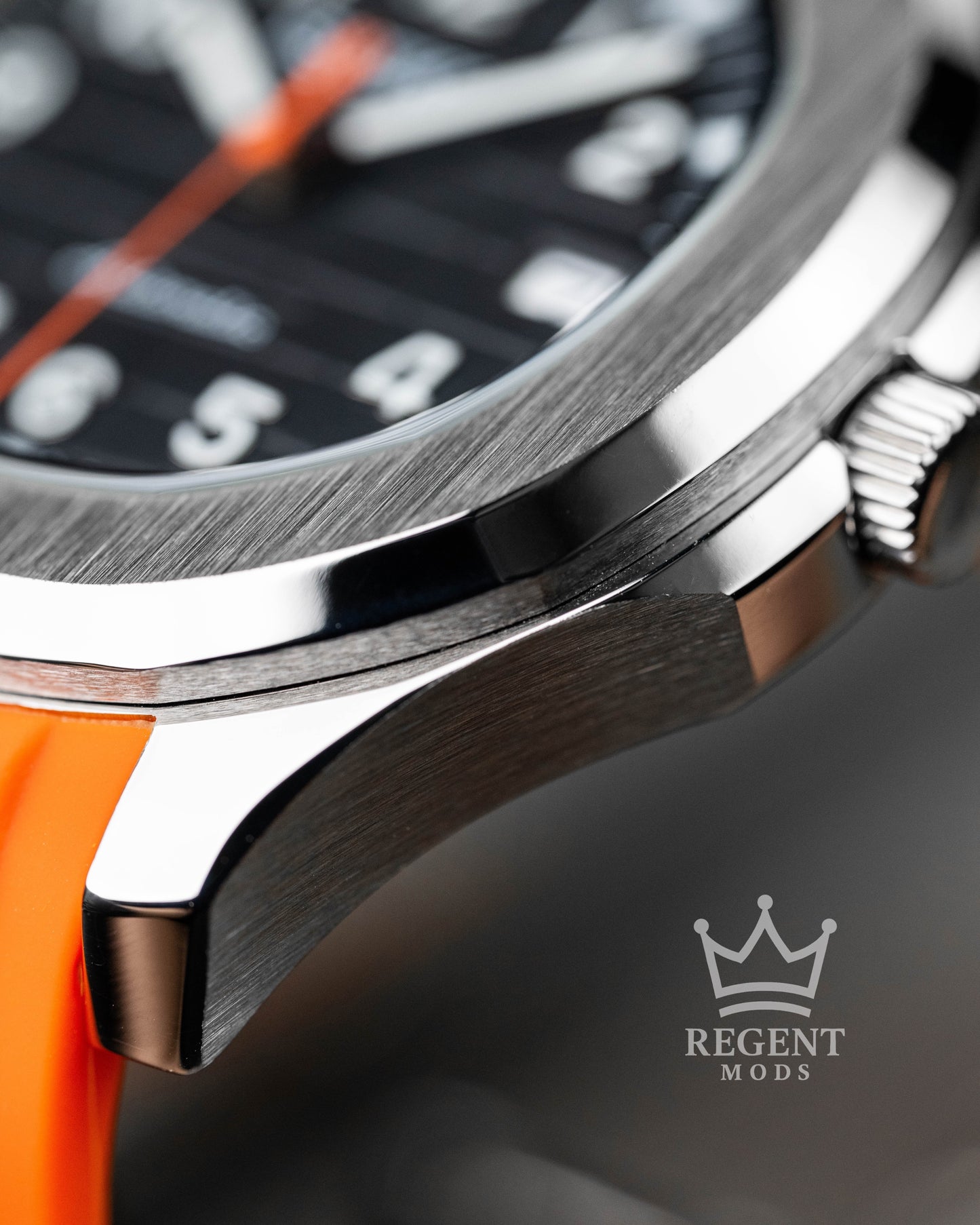 Custom Seiko Mod Aquanaut Nautilus With Black Dial Orange Seconds Hand Waffle Textured Face And Brushed Steel Bezel On Orange Rubber Strap