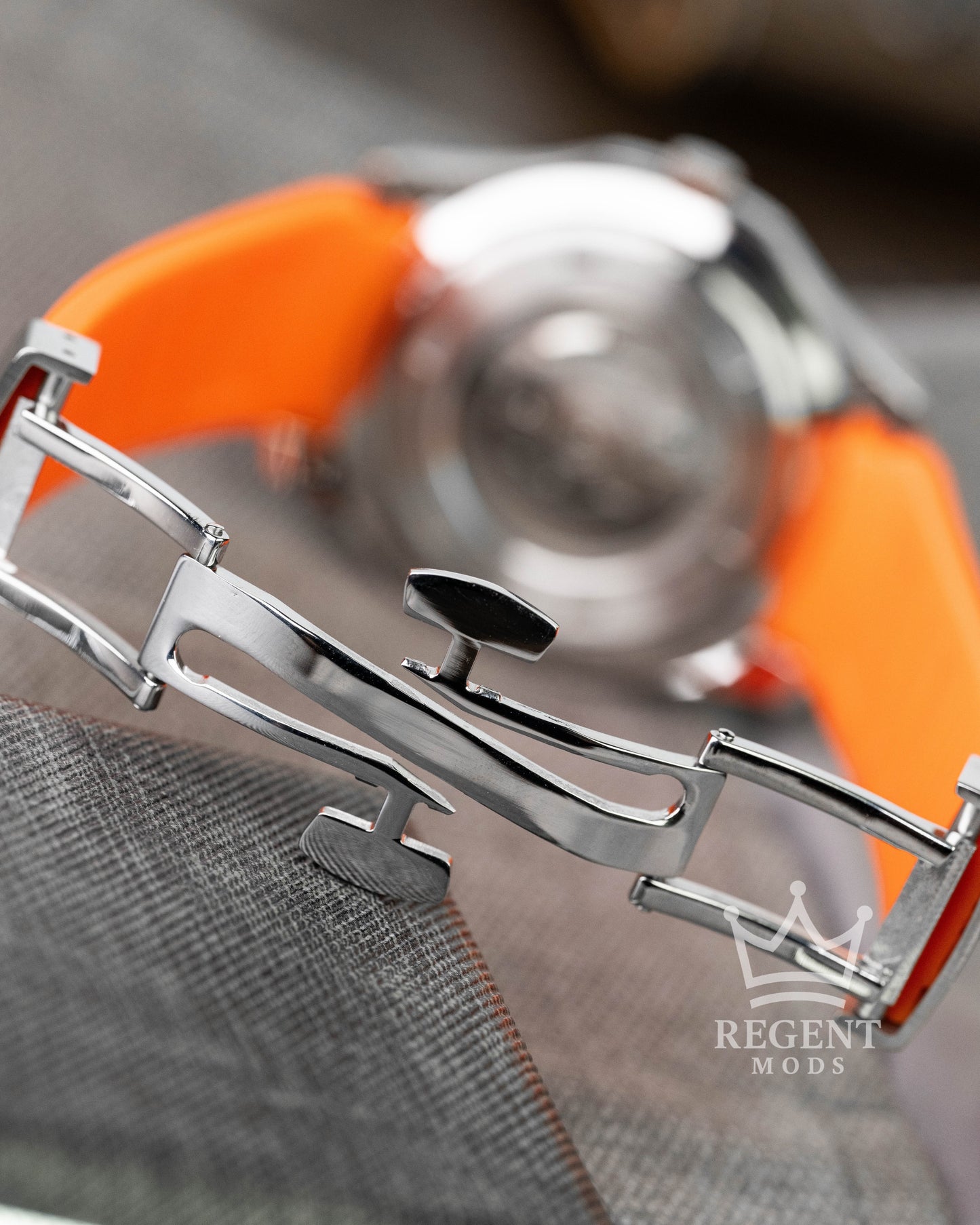 Custom Seiko Mod Aquanaut Nautilus With Black Dial Orange Seconds Hand Waffle Textured Face And Brushed Steel Bezel On Orange Rubber Strap