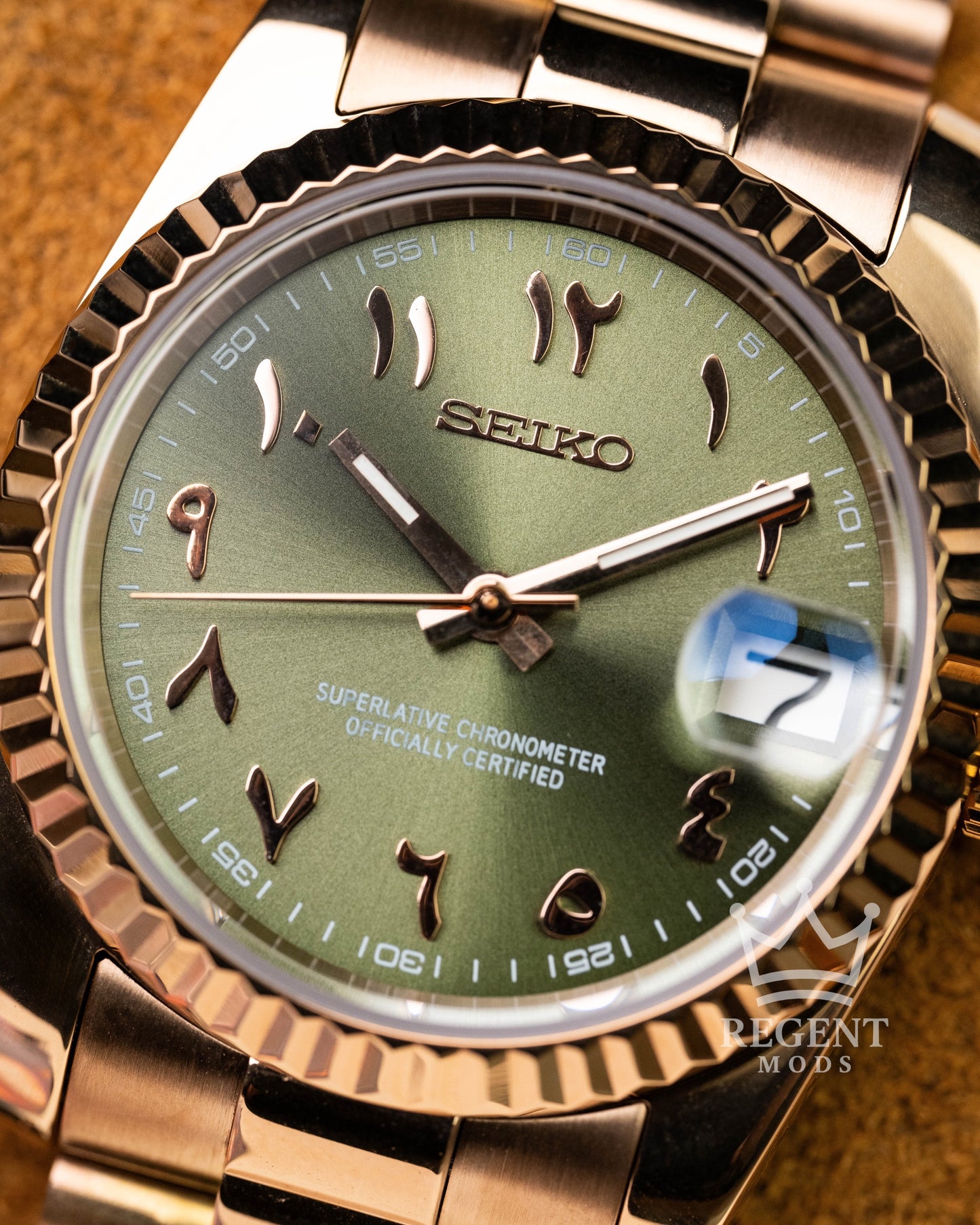 Custom Seiko Mod Datejust With Olive Green Sunburst Dial Arabic Numerals Fluted Bezel And Rosegold President Bracelet And Case